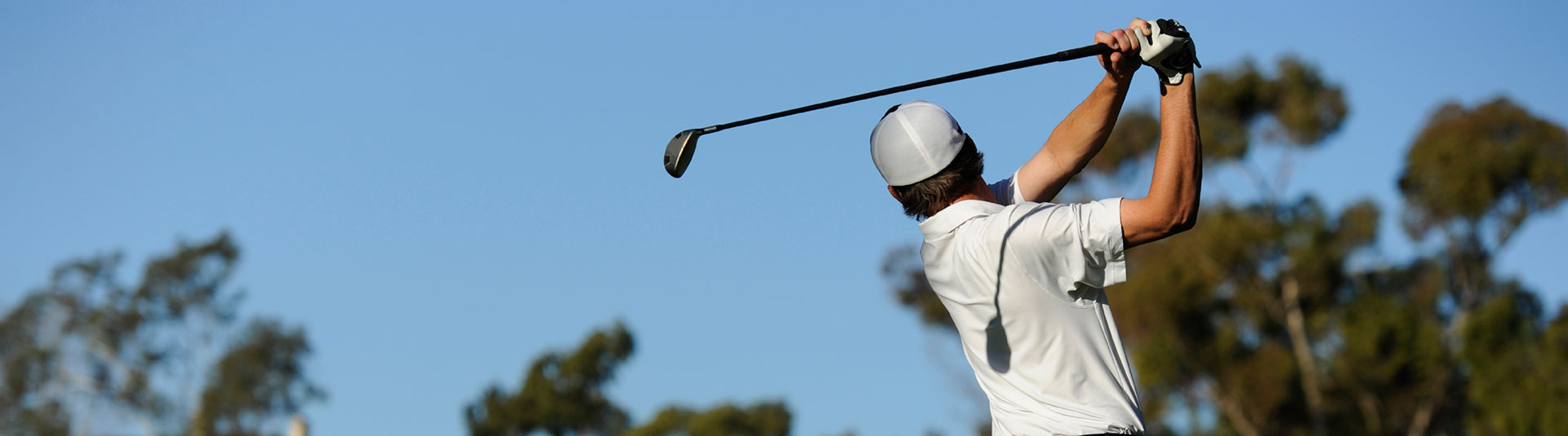 golfer practicing his swing